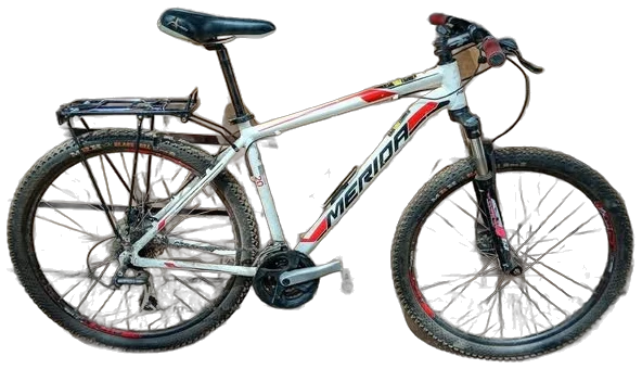 Merida mountain bike with a rear rack, ready for hire at Green Cycle Shop